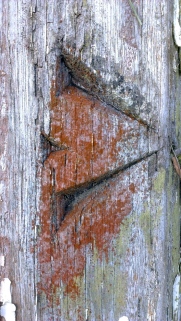 broad-arrow carved at front gate